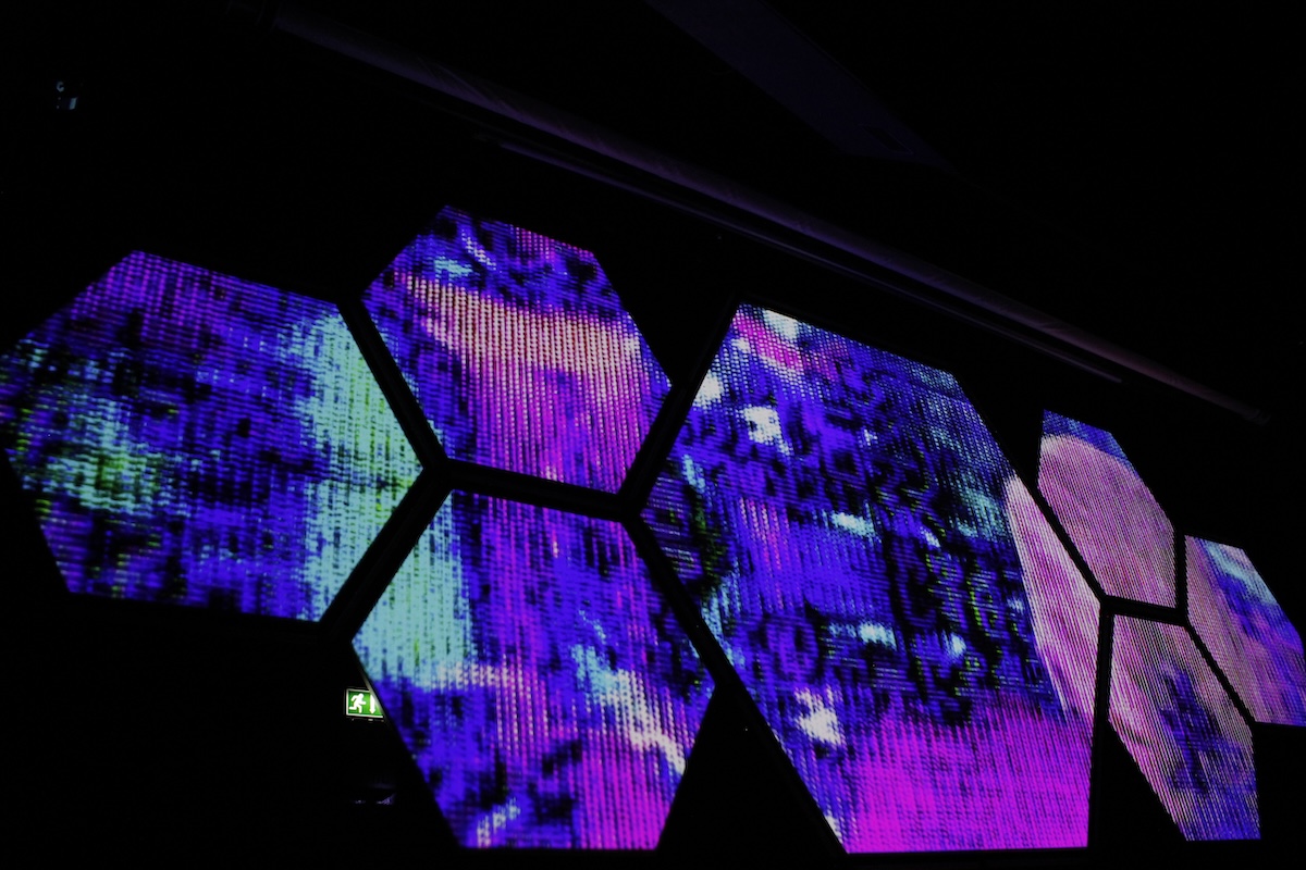 glitchy visuals on seven hexagons